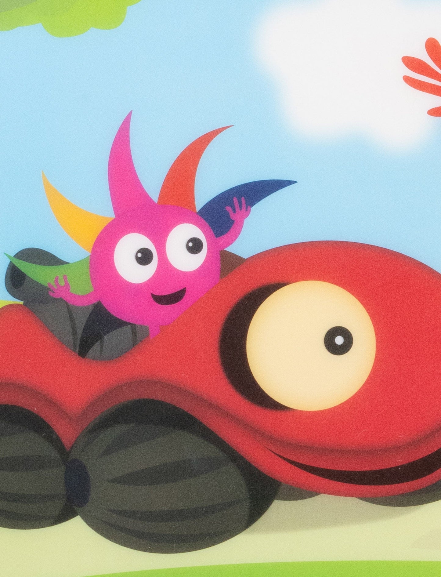 Colorful children's placemat featuring Babblarna characters in a cheerful outdoor scene with trees and clouds.