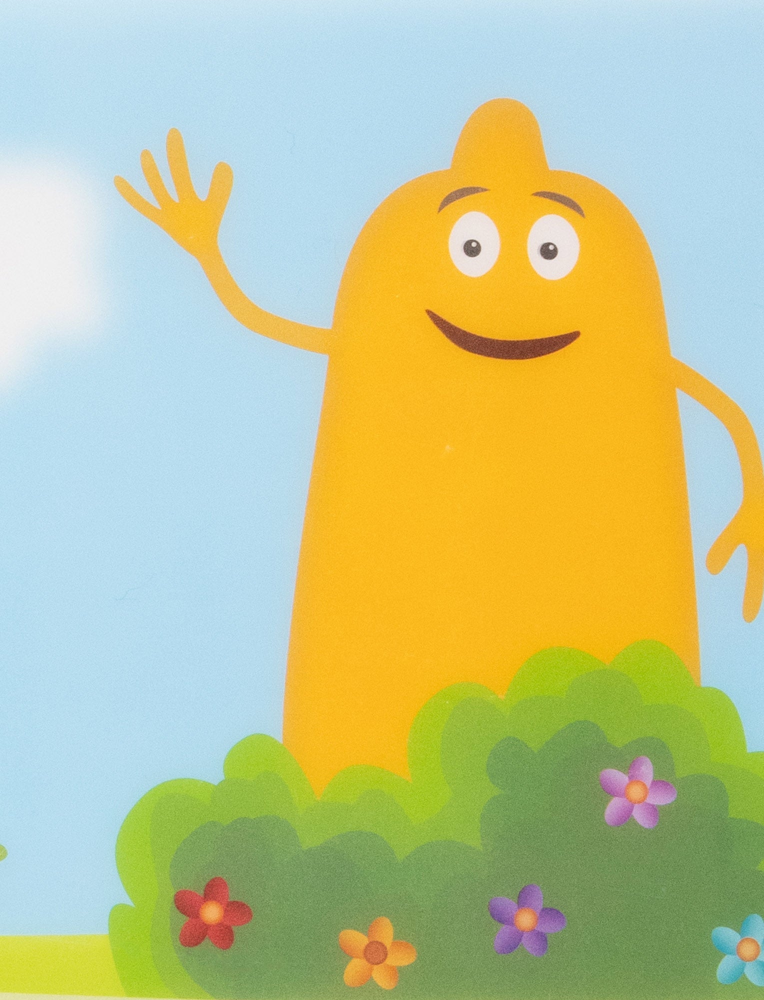 Image of Colorful children's placemat featuring Babblarna characters in a cheerful outdoor scene with trees and clouds.