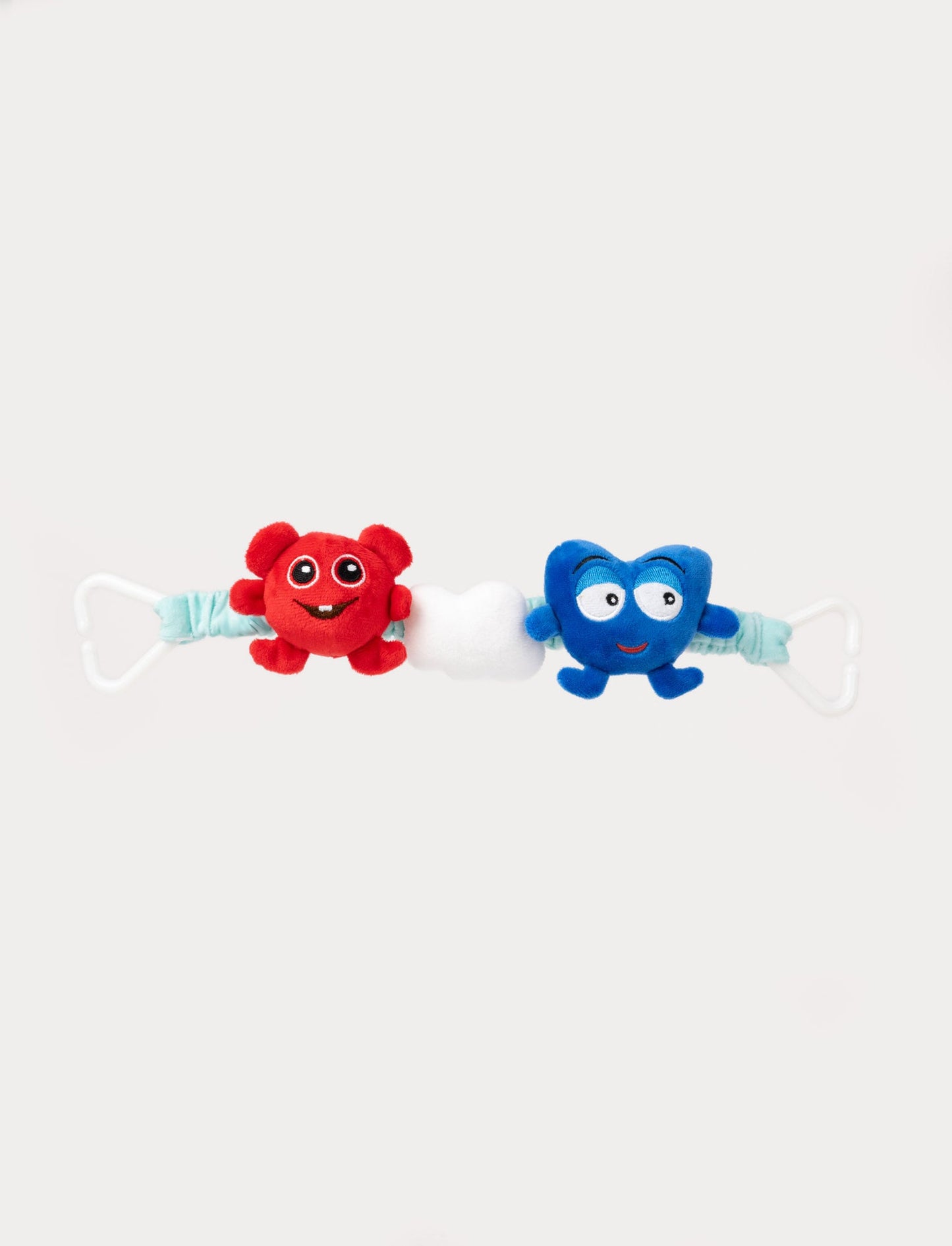 A soft stroller toy featuring Babblarna characters with plush figures and attachment clips.