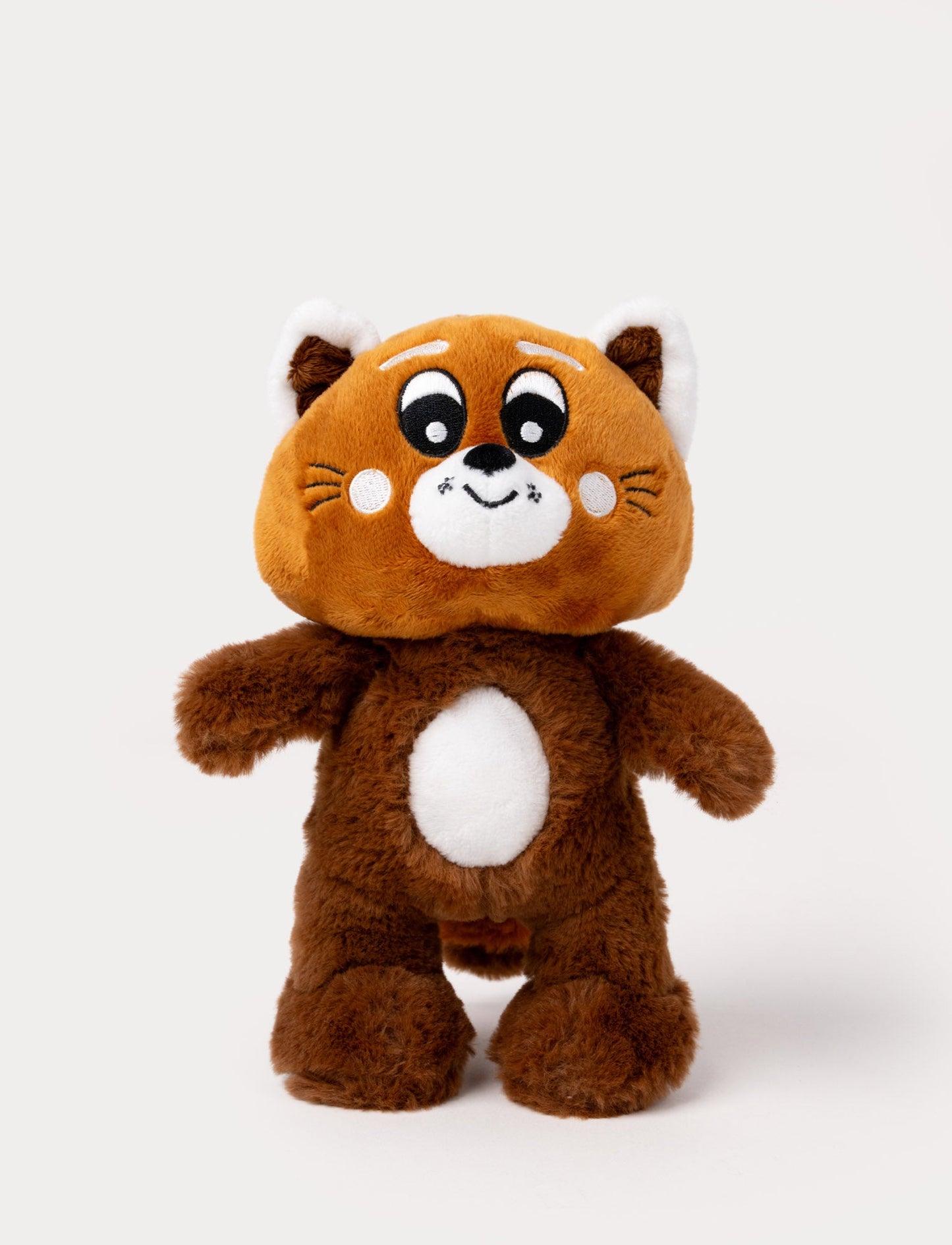 A plush toy of a red panda with a round head, white ears, and a friendly expression.
