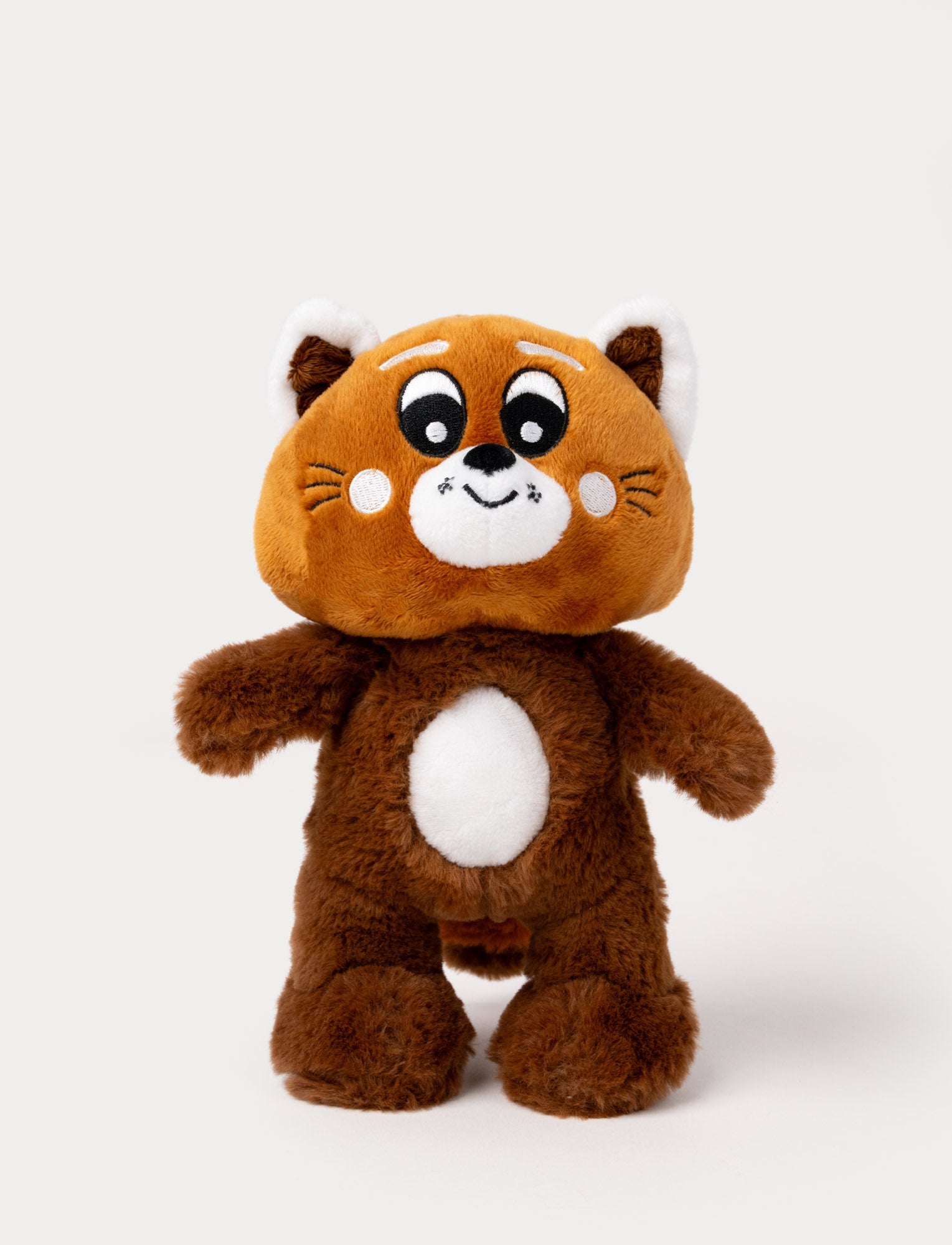 Image of A plush toy of a red panda with a round head, white ears, and a friendly expression.