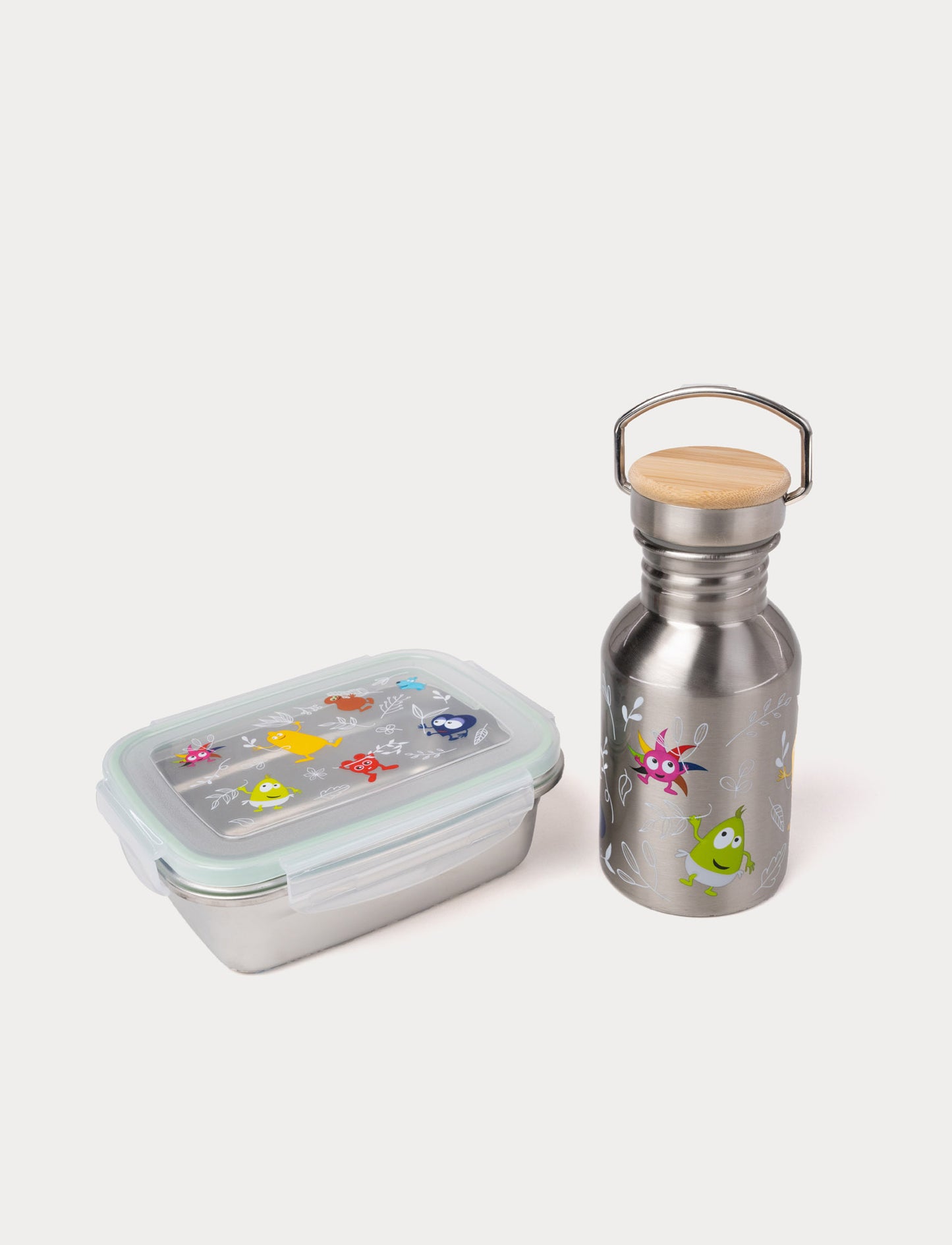 A stainless steel lunch box with a transparent lid and a matching water bottle, both decorated with Babblarna characters.