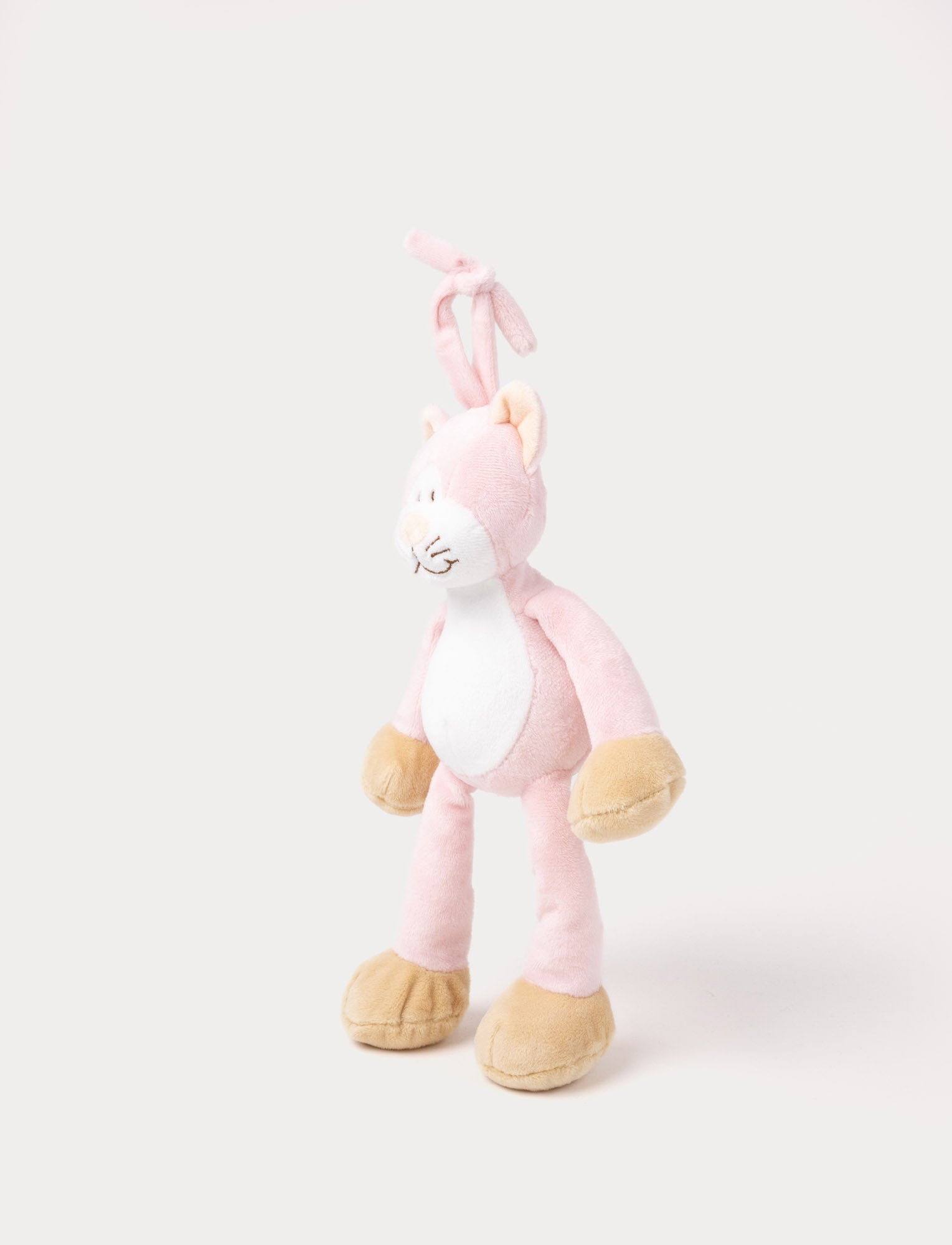 Image of A plush pink cat music box toy with a white belly, beige paws, a stitched smiling face, and a fabric loop on top for hanging