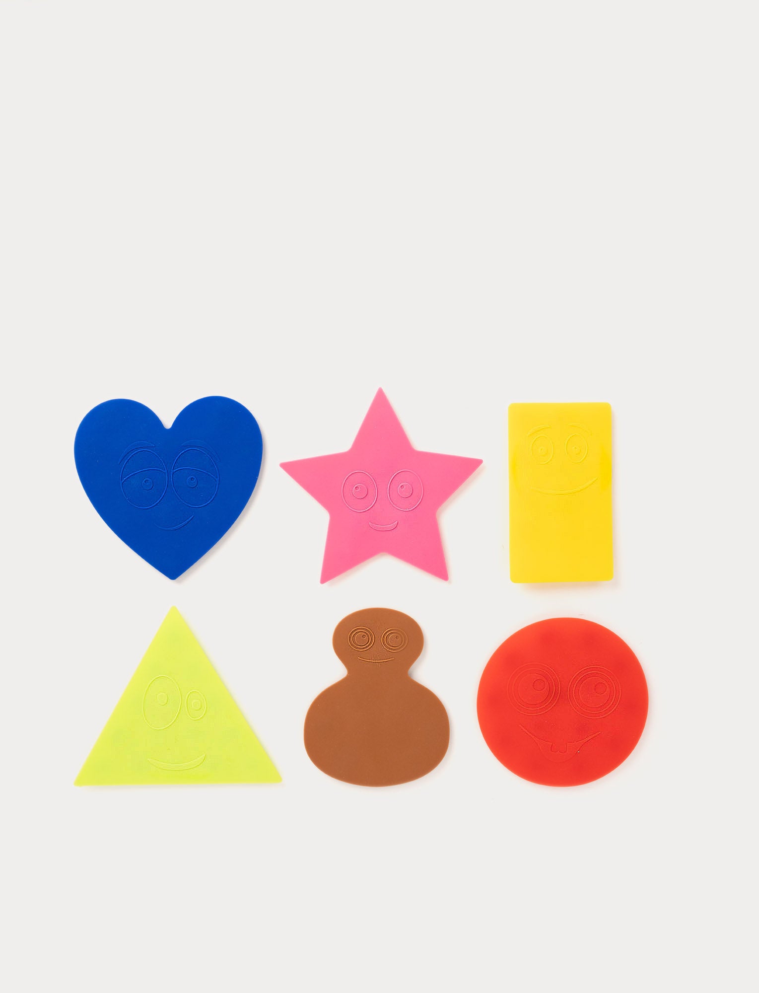 Image of Babblarna bath mats i six different colors with smiling faces
