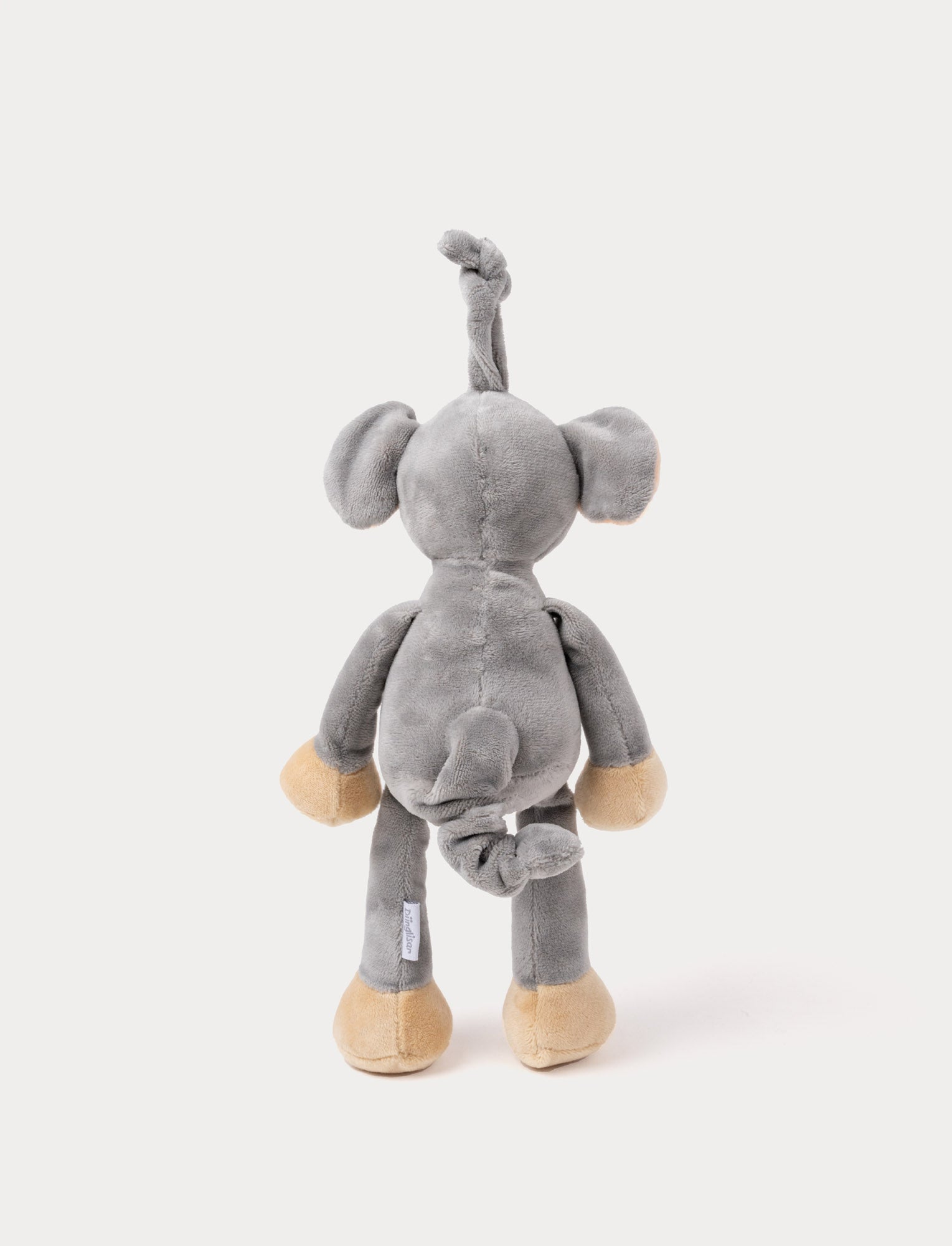 Image of A plush elephant music box with large ears, a white belly, beige feet, and a fabric loop for hanging.