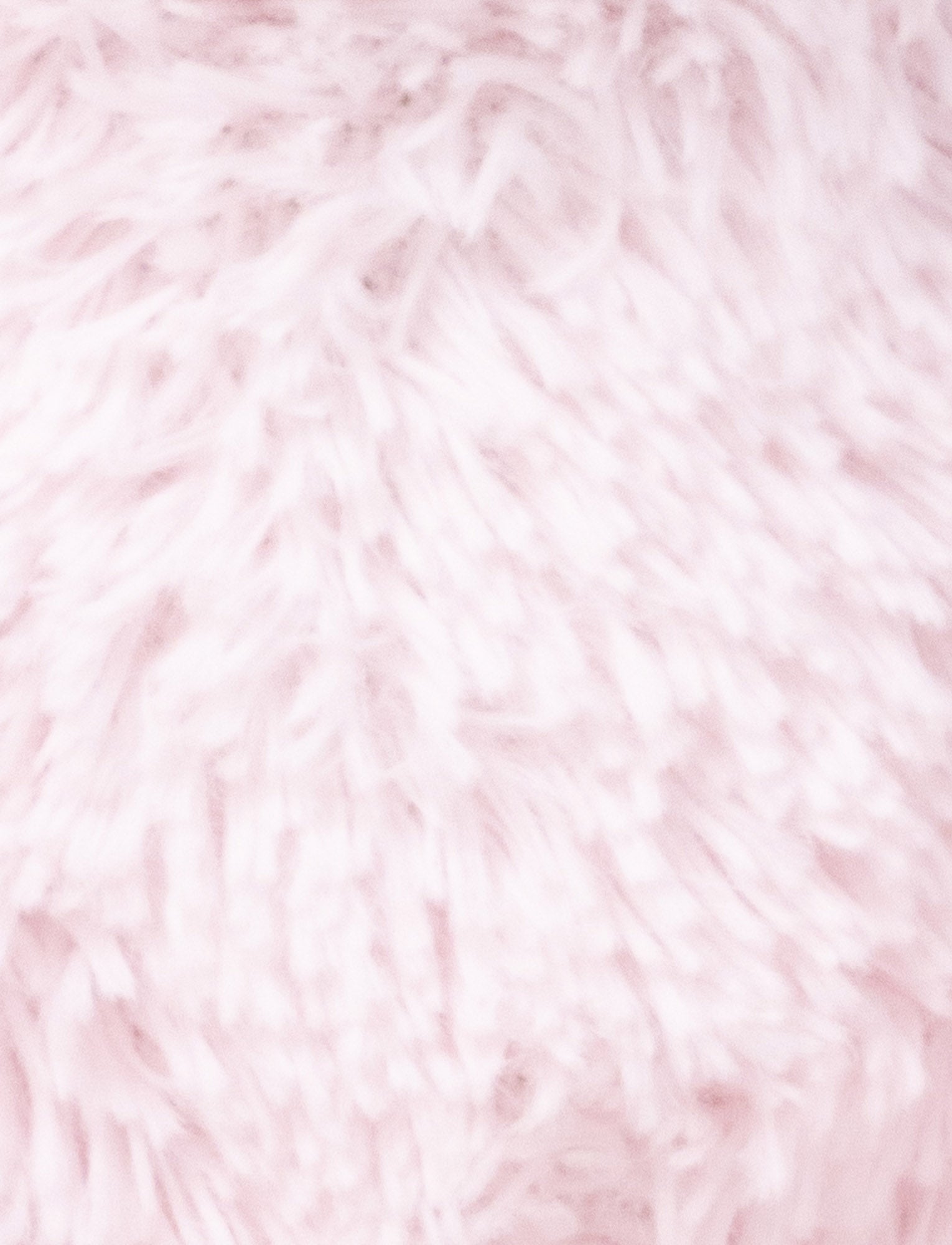 Image of A soft pink plush bunny with floppy ears, a beige nose, and golden-stitched eyes