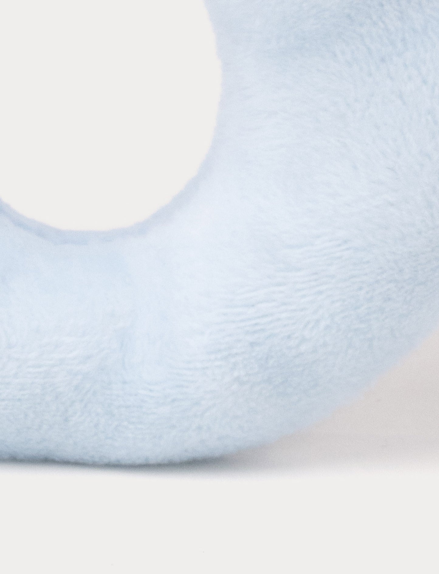 Soft blue baby rattle with a plush bunny head and floppy furry ears.