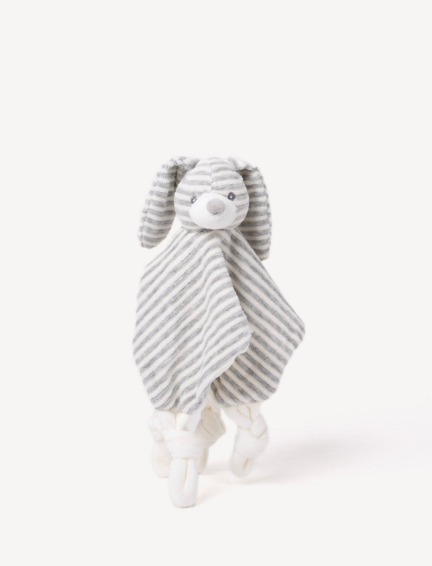 A grey and white striped plush bunny comforter with floppy ears and knotted fabric ends.