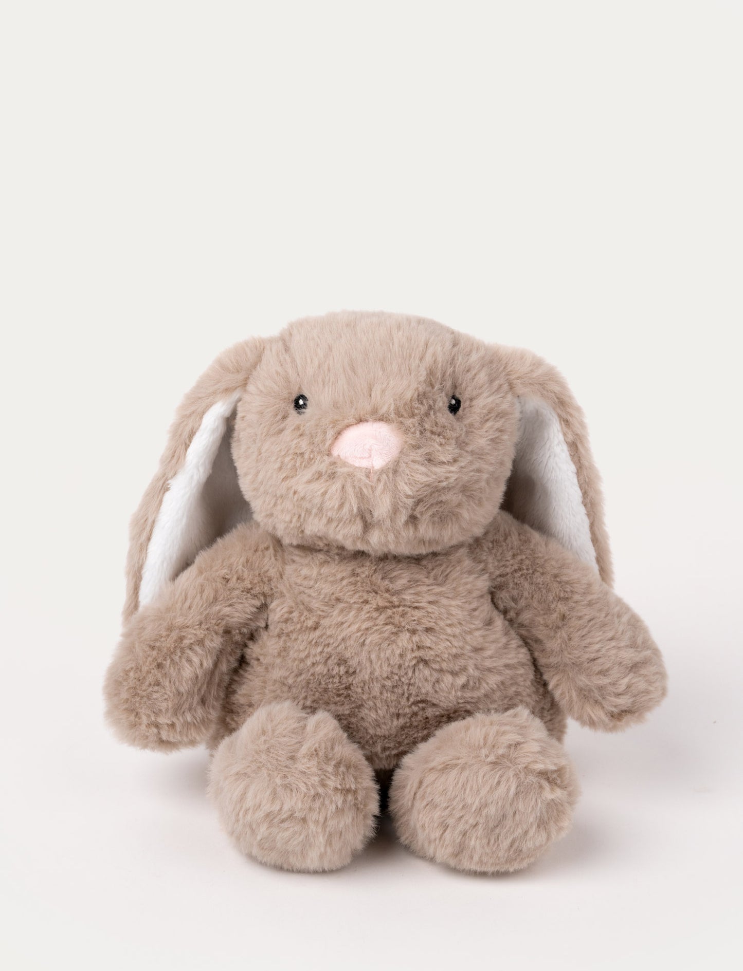 Soft, light brown plush bunny with long floppy ears, black eyes, and a pink stitched nose.