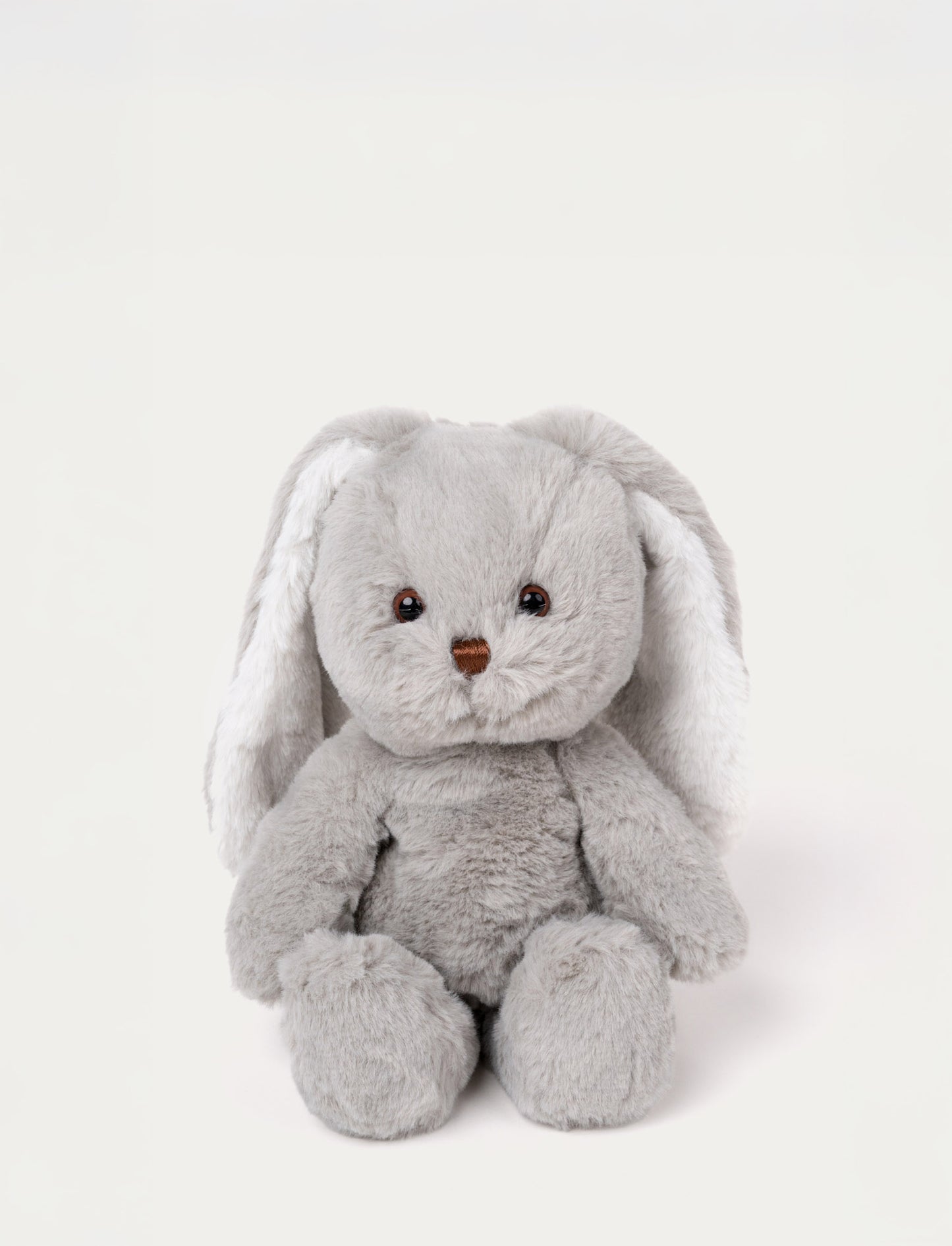 Soft grey plush bunny with long floppy ears, brown eyes, and a stitched brown nose.