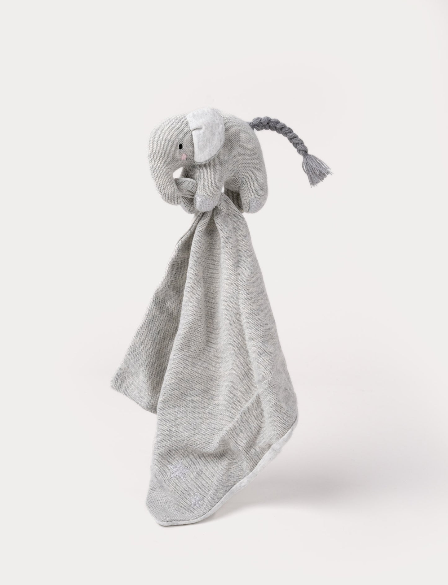 Knitted grey elephant security blanket with soft fabric ears, embroidered eyes, and a braided tail.