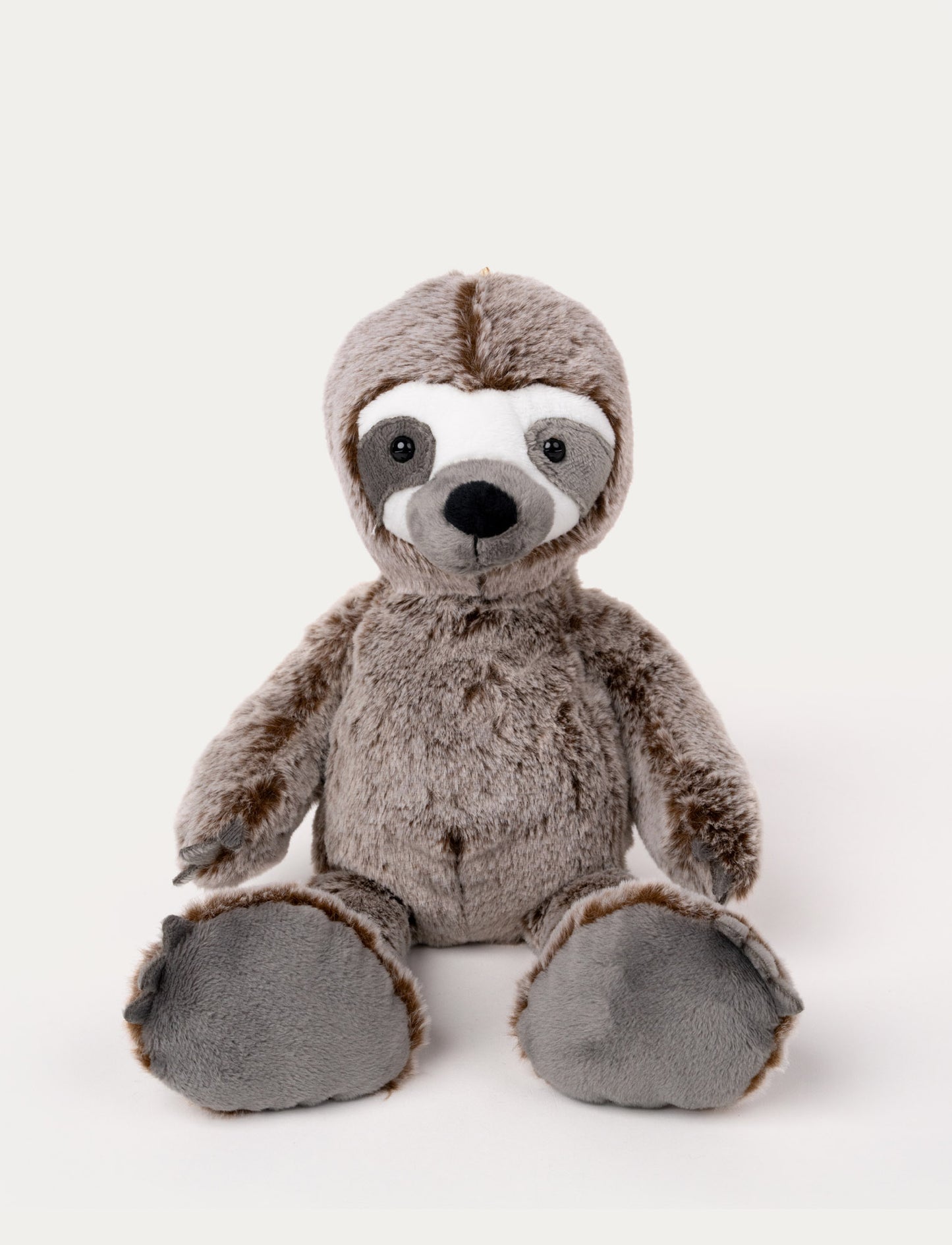 Soft, plush sloth with brown fur, a white face with grey markings, black button eyes, and large padded feet.