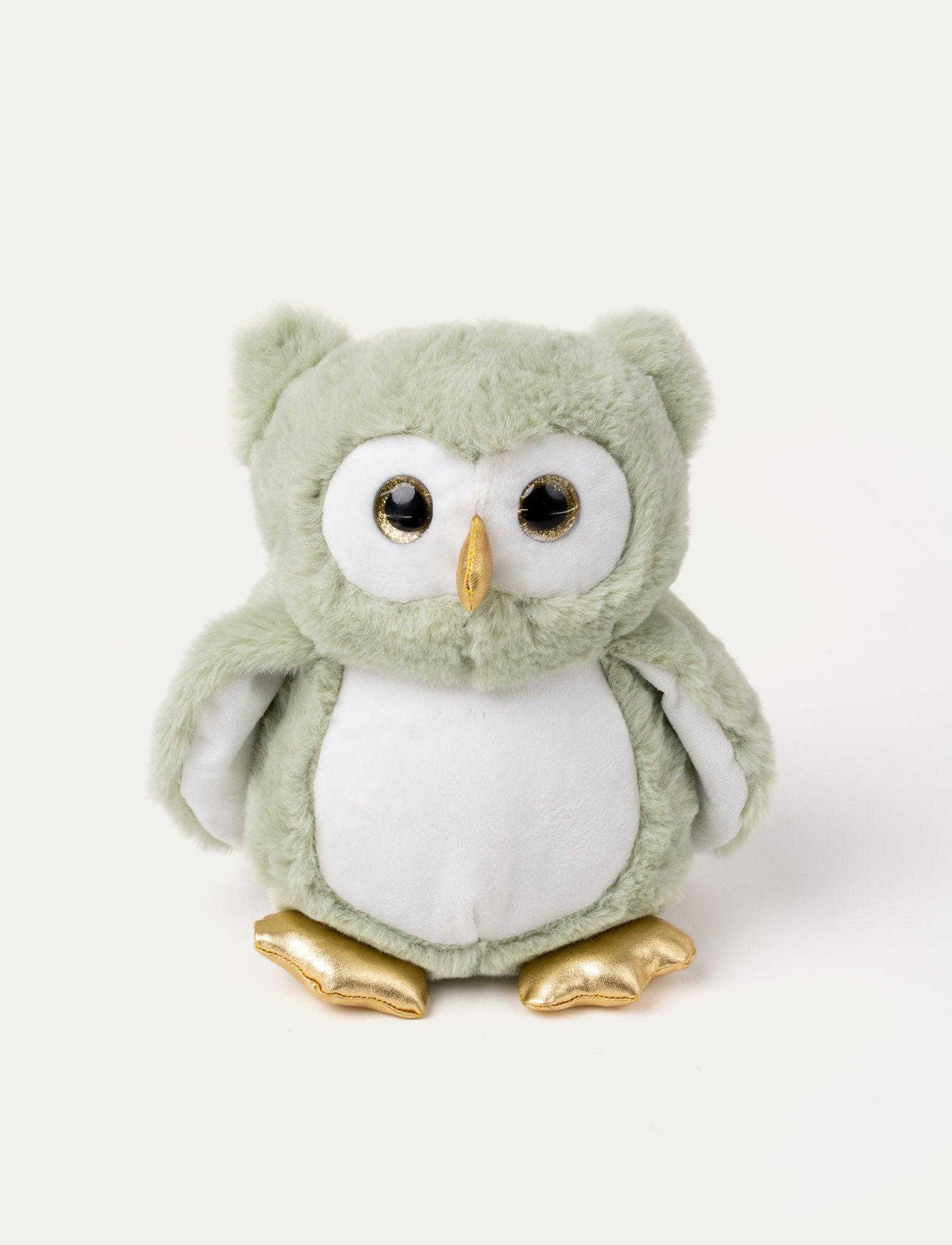Image of Soft green owl plush with a white belly and face that glow in the dark, gold beak and feet, and shiny black eyes.
