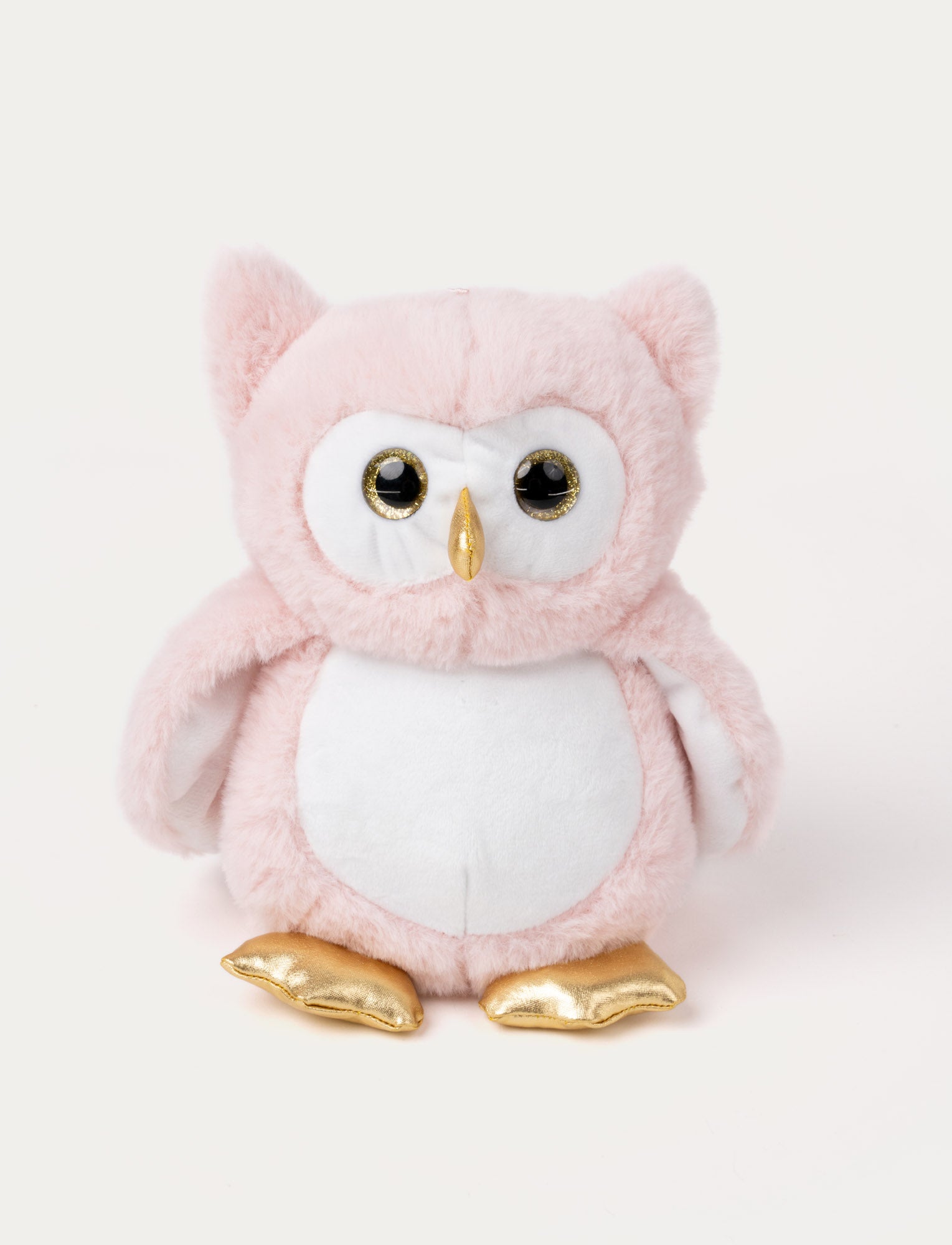 Image of Soft pink owl plush with a white belly and face that glow in the dark, gold beak and feet, and shiny black eyes.