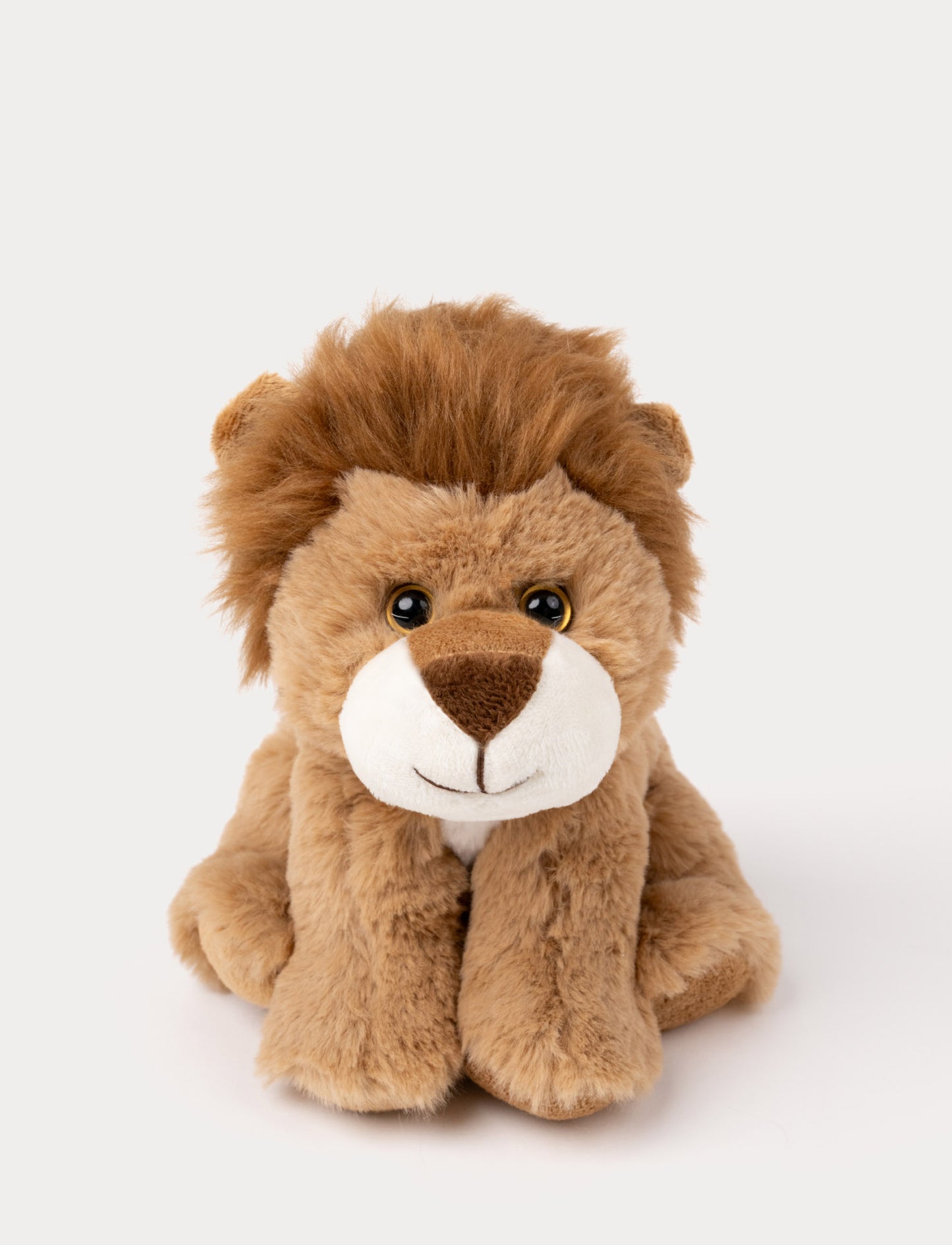 A lion with velvety brown fur, kind eyes, and a comforting expression.