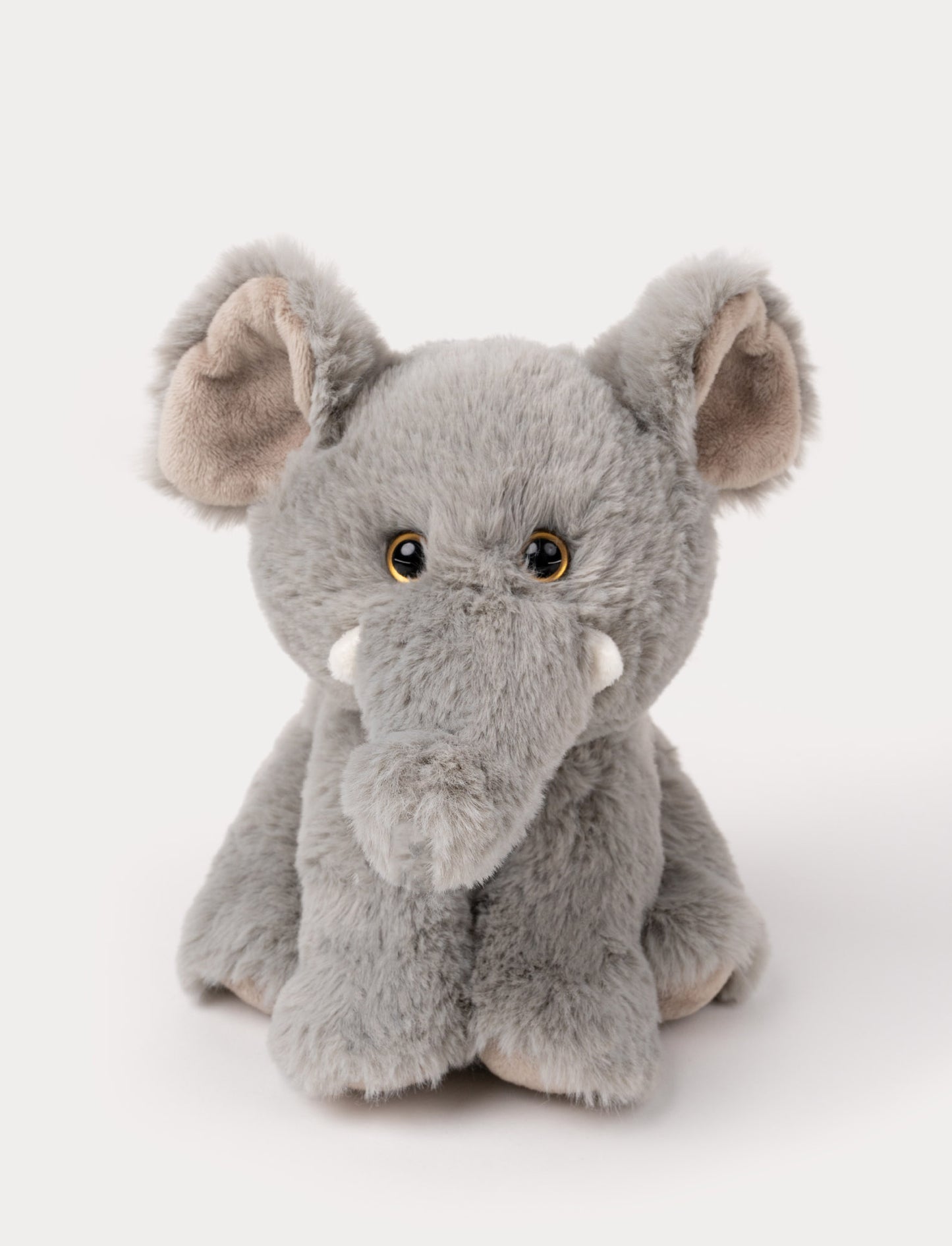 An elephant with cuddly grey fur, kind eyes, and a comforting expression.