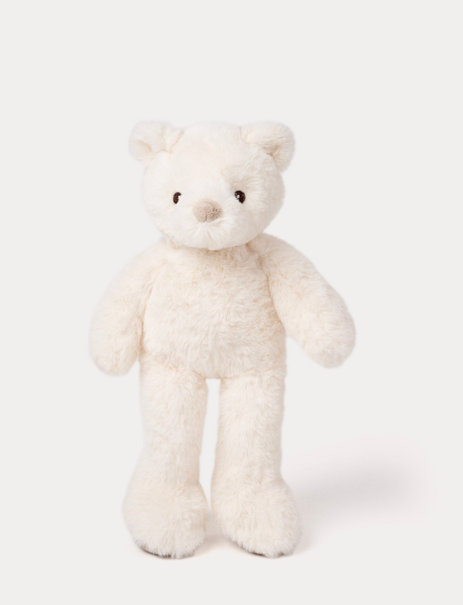 Image of White plush teddy bear with long legs, round ears, and a soft beige nose.