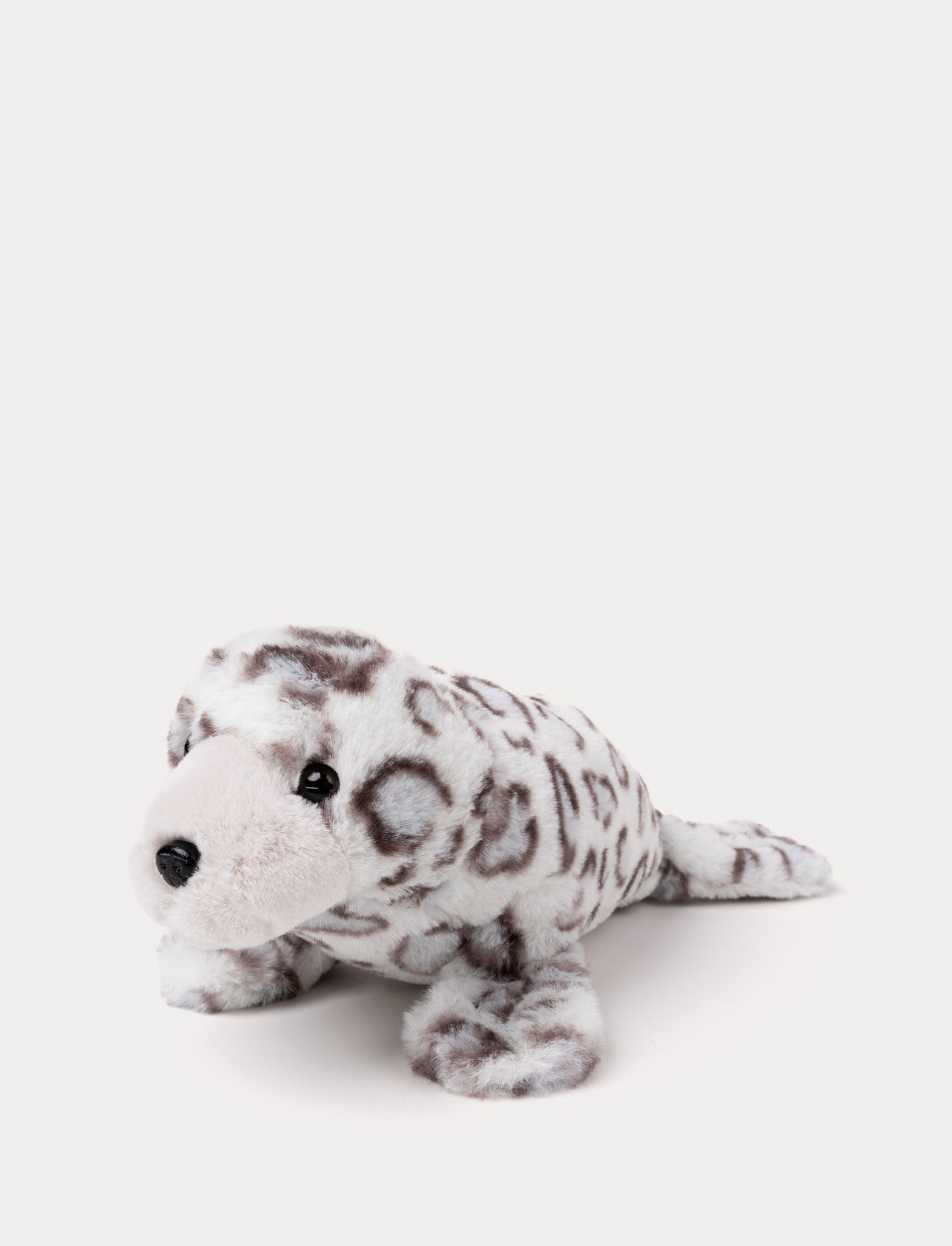 Image of Plush seal with a soft white and gray spotted pattern, black eyes, and a gentle expression.