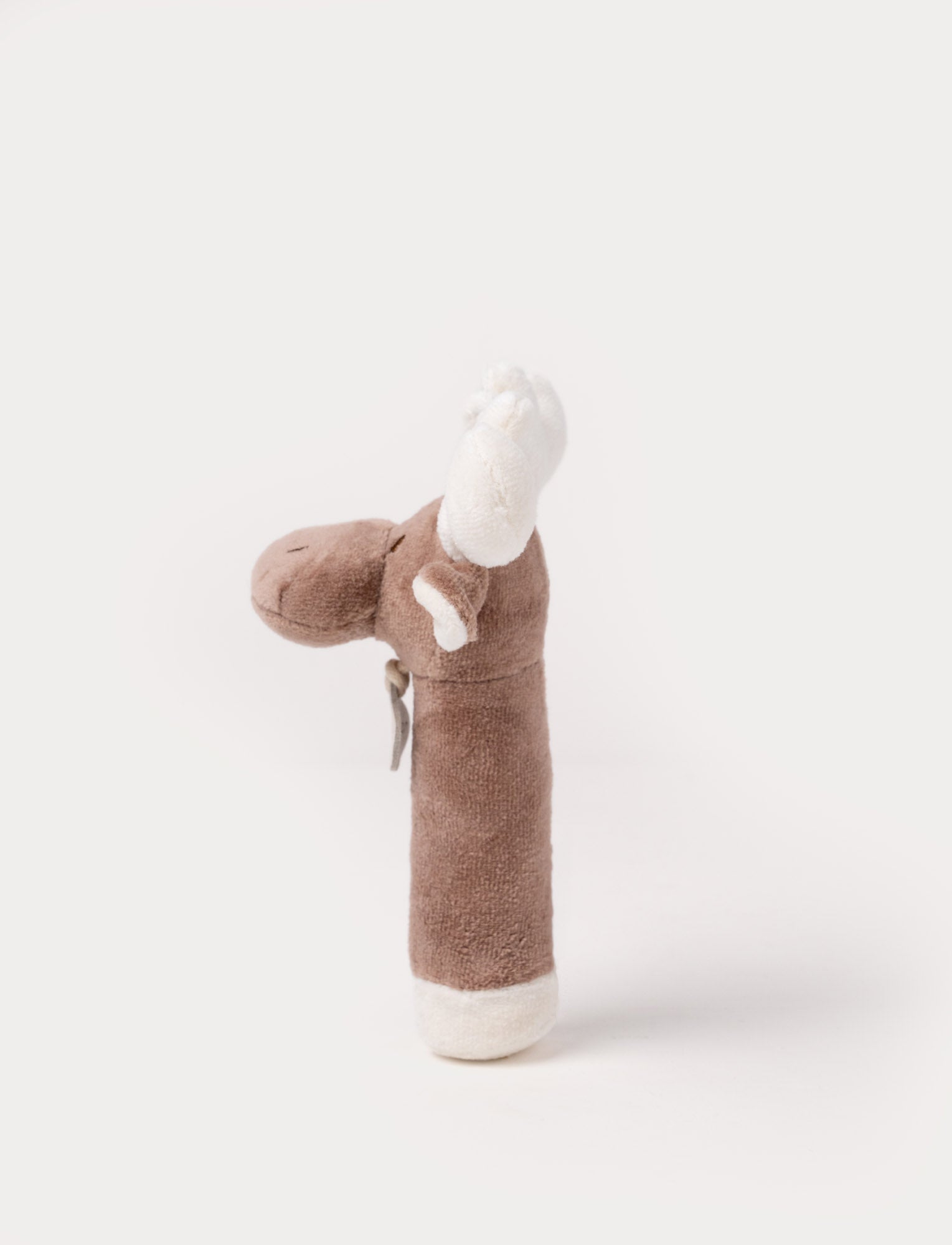 Image of A plush moose rattle with a soft brown body, white antlers, and a stitched face
