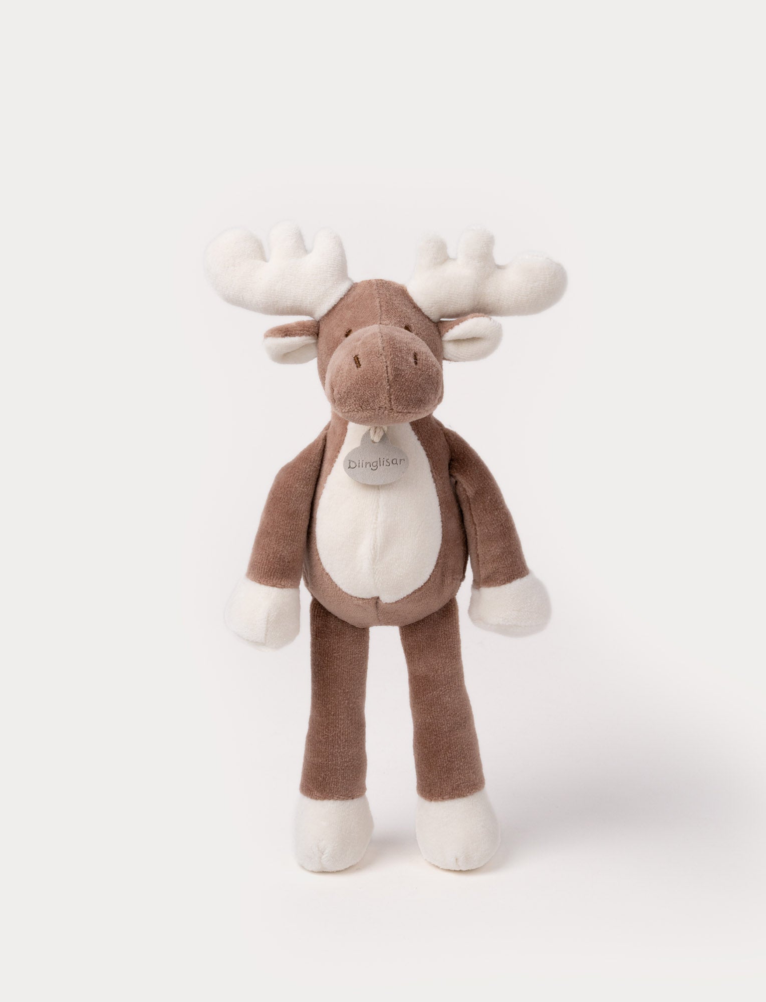 Image of A soft brown plush moose, with white antlers, a stitched face and white and brown details.