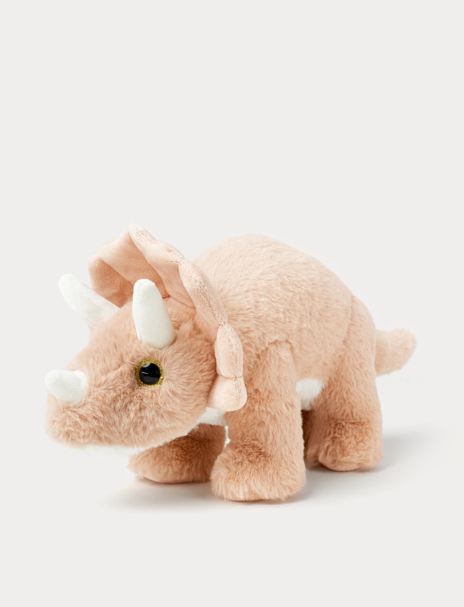 Image of Soft peach Triceratops dinosaur plush toy with fluffy fur and three white horns