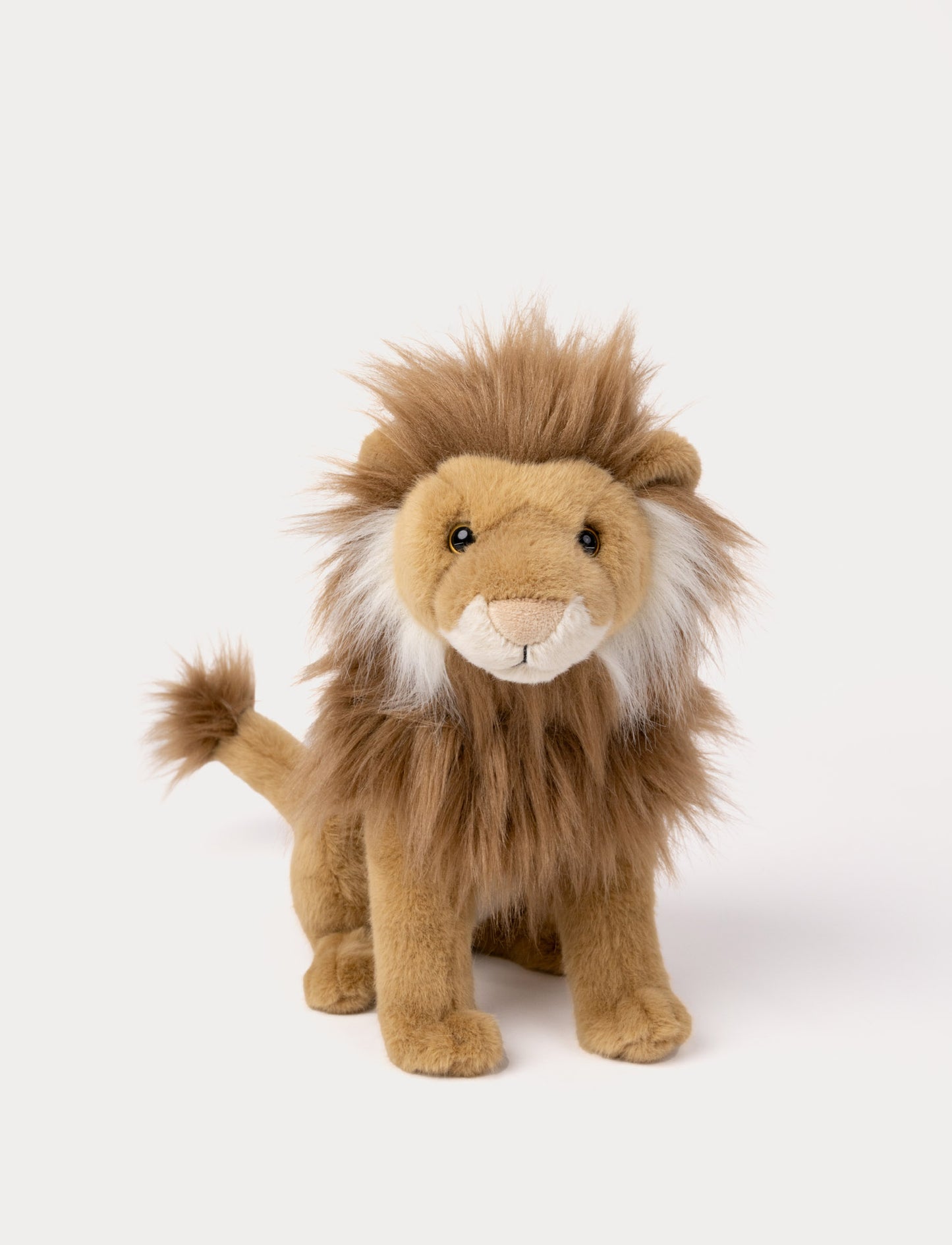Realistic lion plush toy sitting with fluffy brown mane and tan fur.
