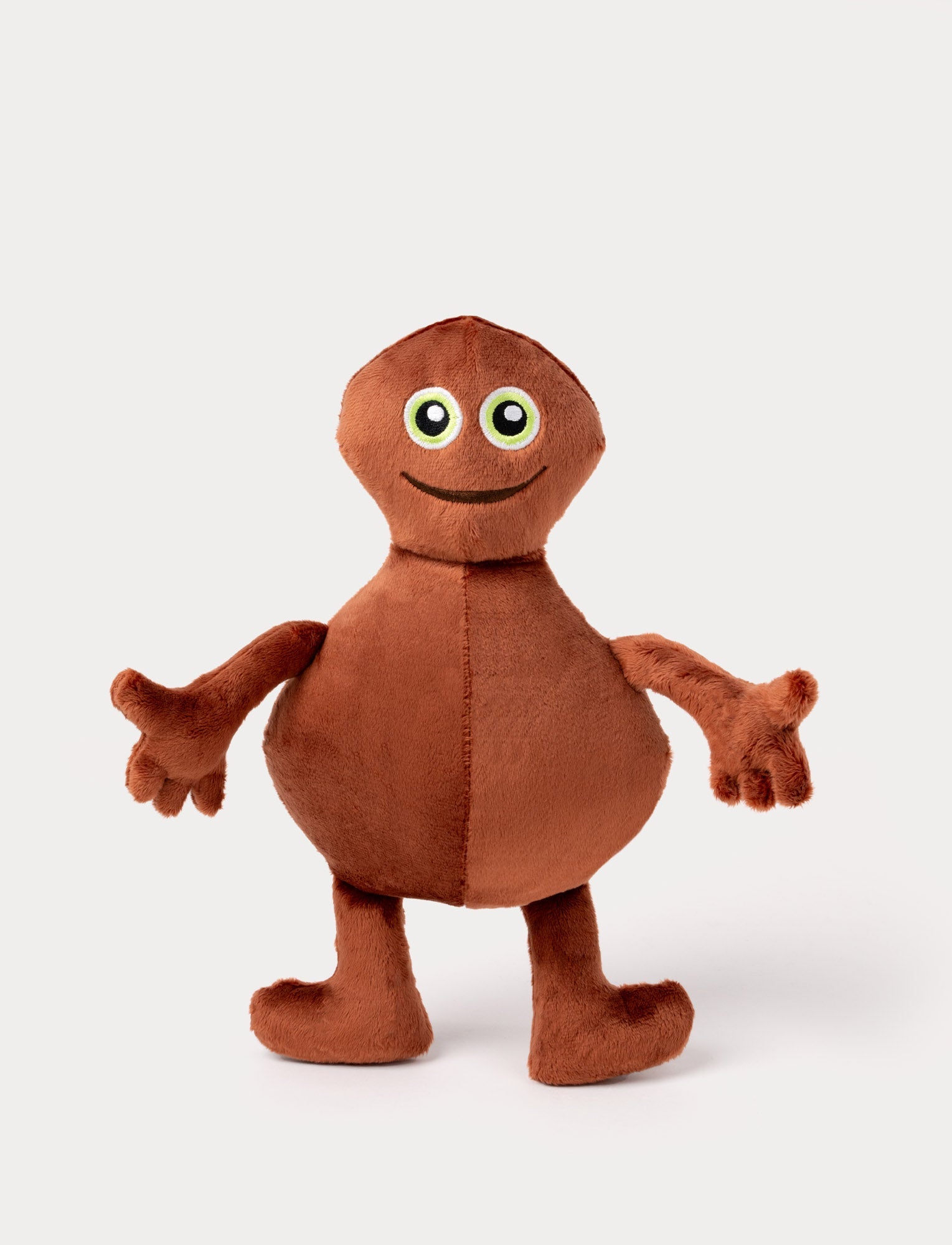  Image of Brown plush toy with a round body, long arms, big green eyes, and a friendly embroidered smile.