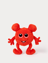 Red plush toy with a round body, large ears, big eyes, and a cheerful embroidered smile with a small tooth.
