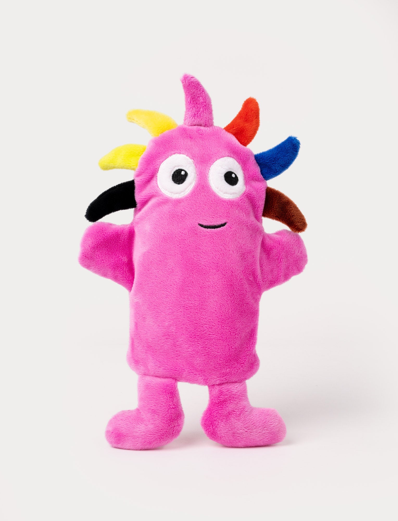  Image of Pink hand puppet with large eyes, a cheerful smile, and colorful spikes on its head.