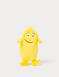 A yellow plush Bibbi with a friendly smile and very small and oblong deisgn  