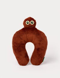 Brown plush neck pillow with a character head, large green eyes, and a friendly embroidered smile.
