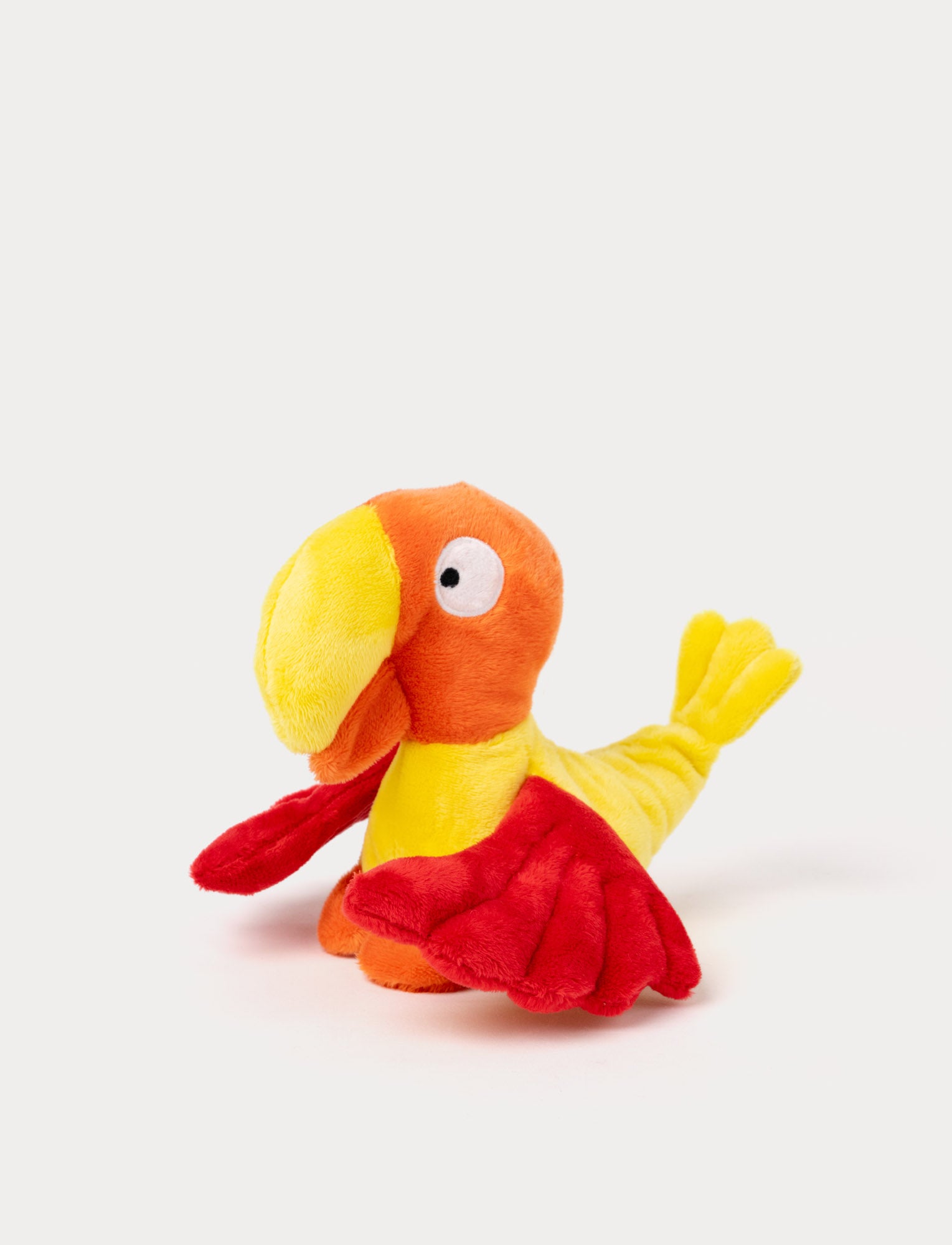  Image of Colorful Faffa plush bird with bright yellow and orange feathers, a cheerful face, and small wings.