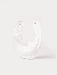 Soft, white, double-layered cotton Miffy dribble bib with adjustable snap buttons 