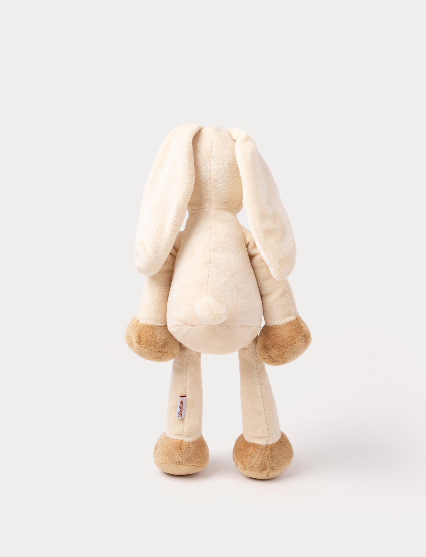 A plush beige bunny with long floppy ears, a white belly, and brown paws.
