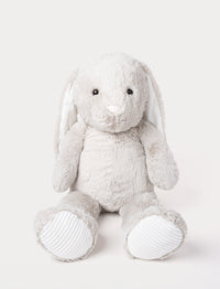 Soft grey plush bunny with long floppy ears, a pink nose, and ribbed white fabric on its paws.
