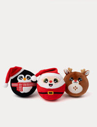 Three Christmas-themed plush toys: a penguin, Santa Claus, and reindeer, on a white background.