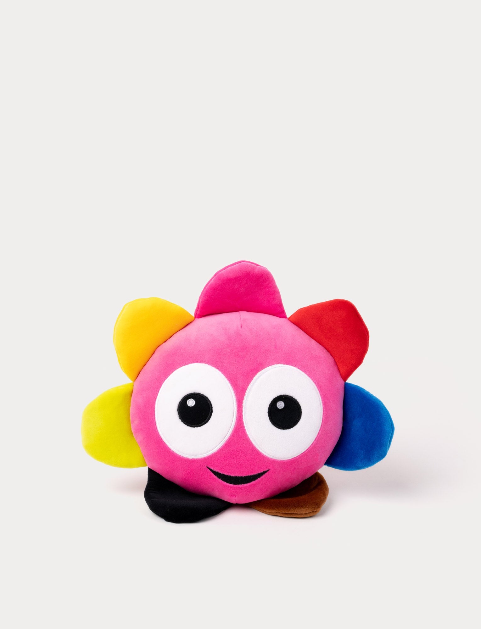  Image of Pink plush toy with large round eyes, a cheerful smile, and colorful petals.