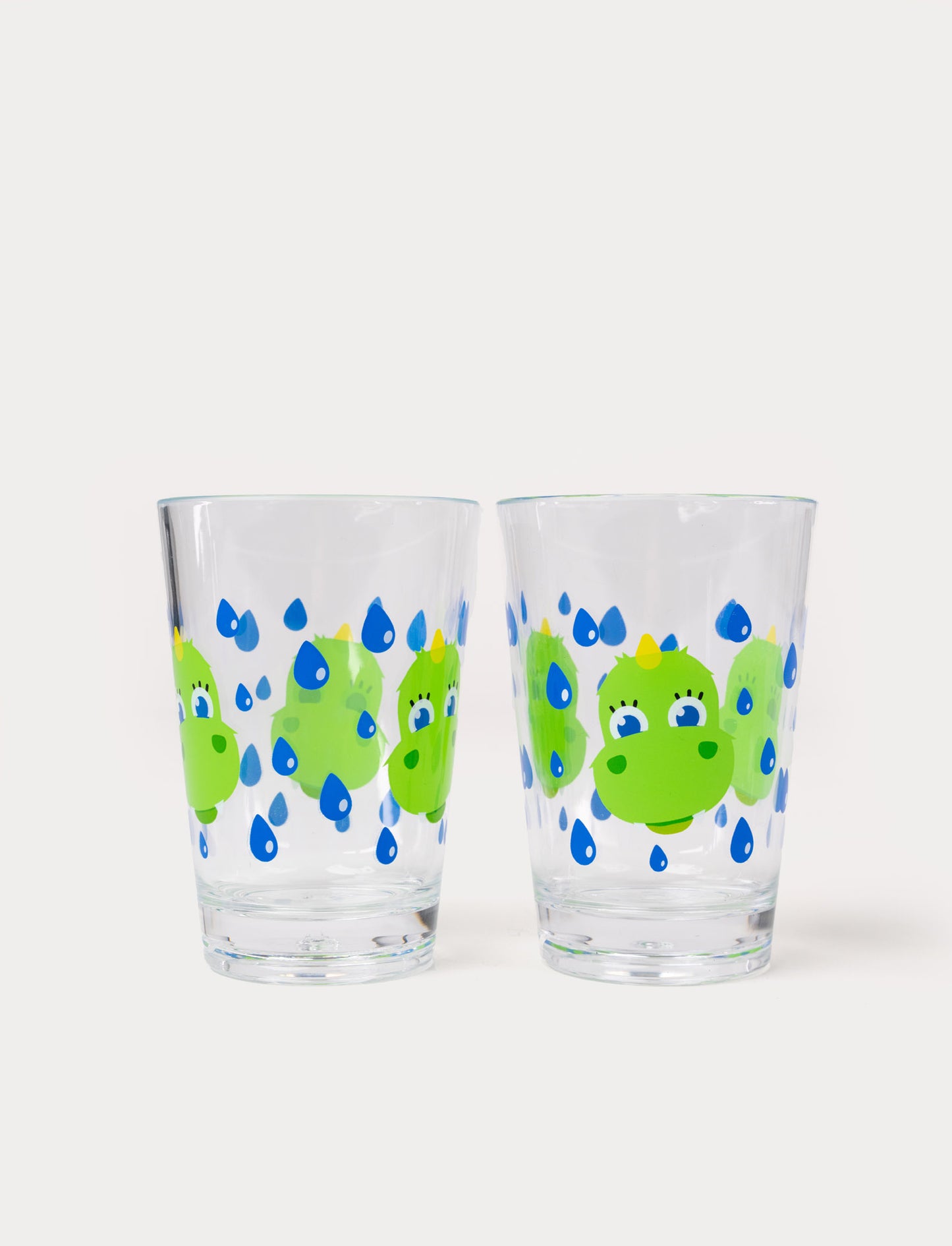 Two clear drinking glasses with a design featuring Bolibompa dragon surrounded by blue raindrops.