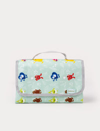 Colorful Babblarna picnic blanket made from durable, water-resistant material, featuring a playful design with the babblarna characters 