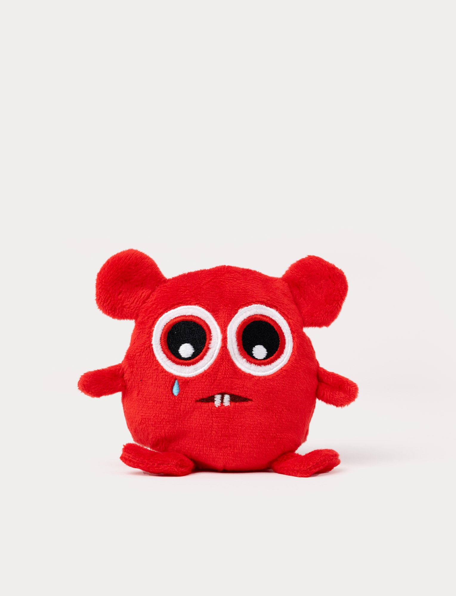  Image of Reversible Babblarna Bobbo plush toy in red with big eyes and a sad, crying face.