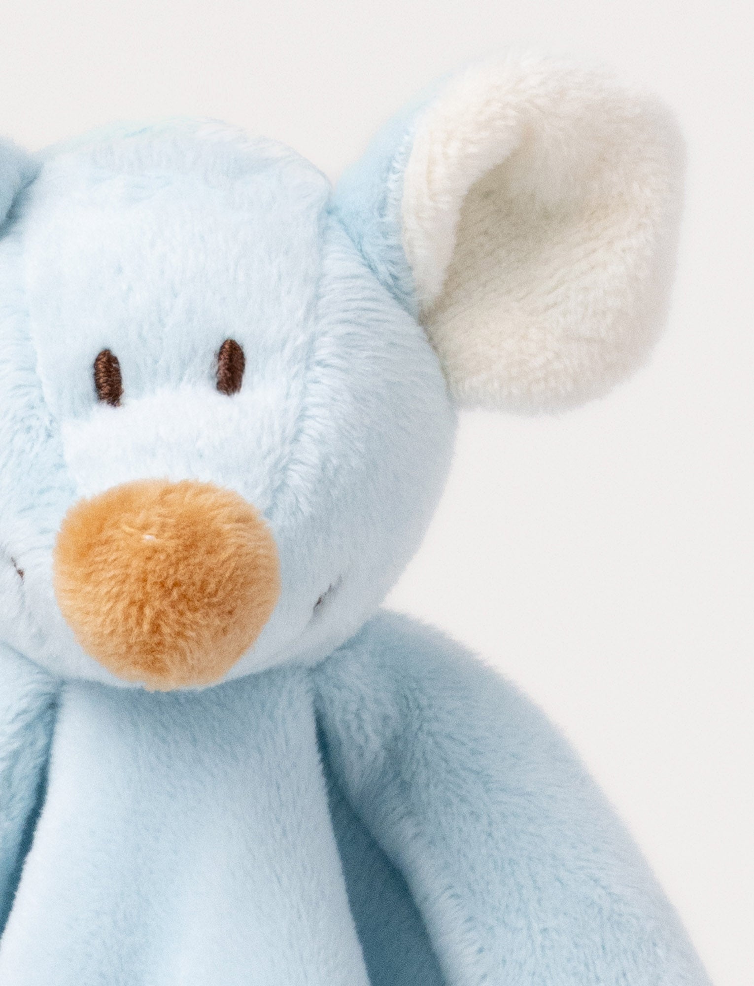  Image of A soft blue baby blanket with a plush mouse, beige contrast details