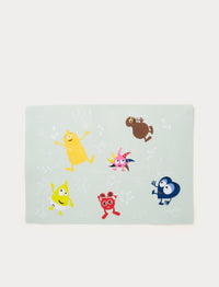 Babblarna silicone placemat with colorful characters on a light green background.