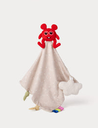 A baby security blanket featuring a Bobbo from Babblarna at the top. A light beige fabric body with white polka dots, a white cloud attachment, and small colorful fabric tabs and knots at the bottom,