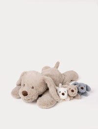 Soft beige plush dog with three small puppy plush toys in white, blue, and beige, designed to fit inside the larger dog’s zippered opening
