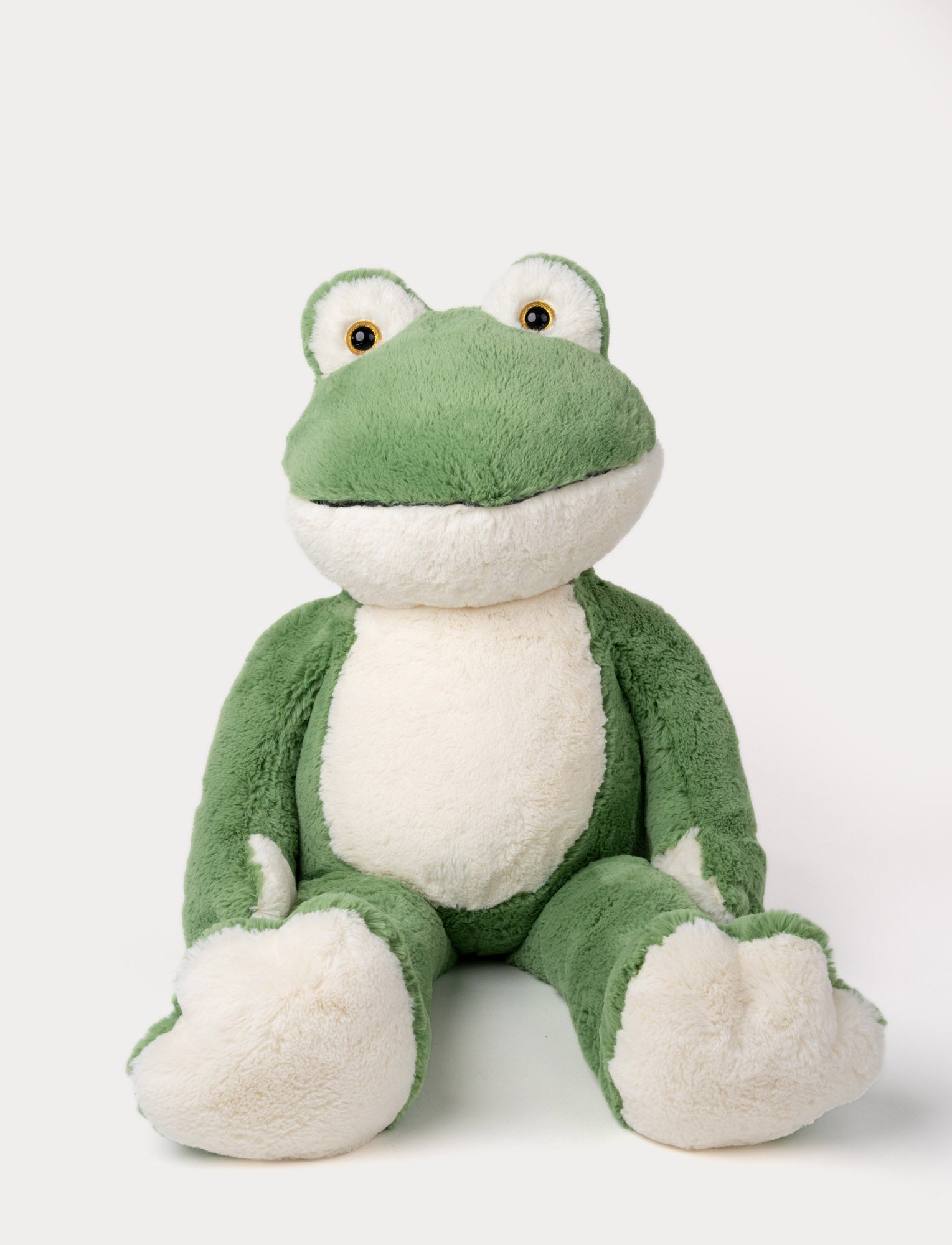  Image of Large soft green and white plush frog toy with a friendly face and cuddly design.