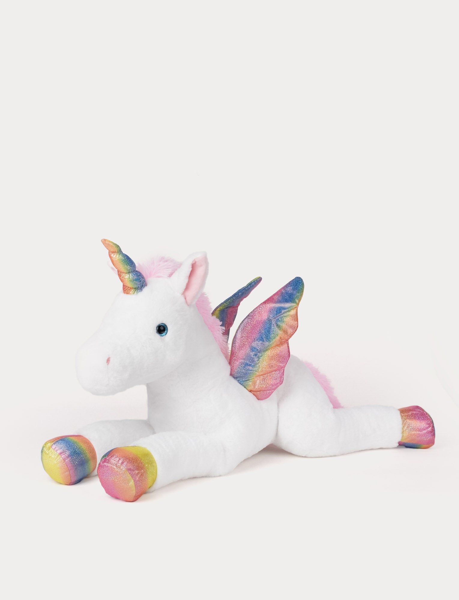  Image of Big white Plush unicorn toy with shimmering rainbow details on a white background