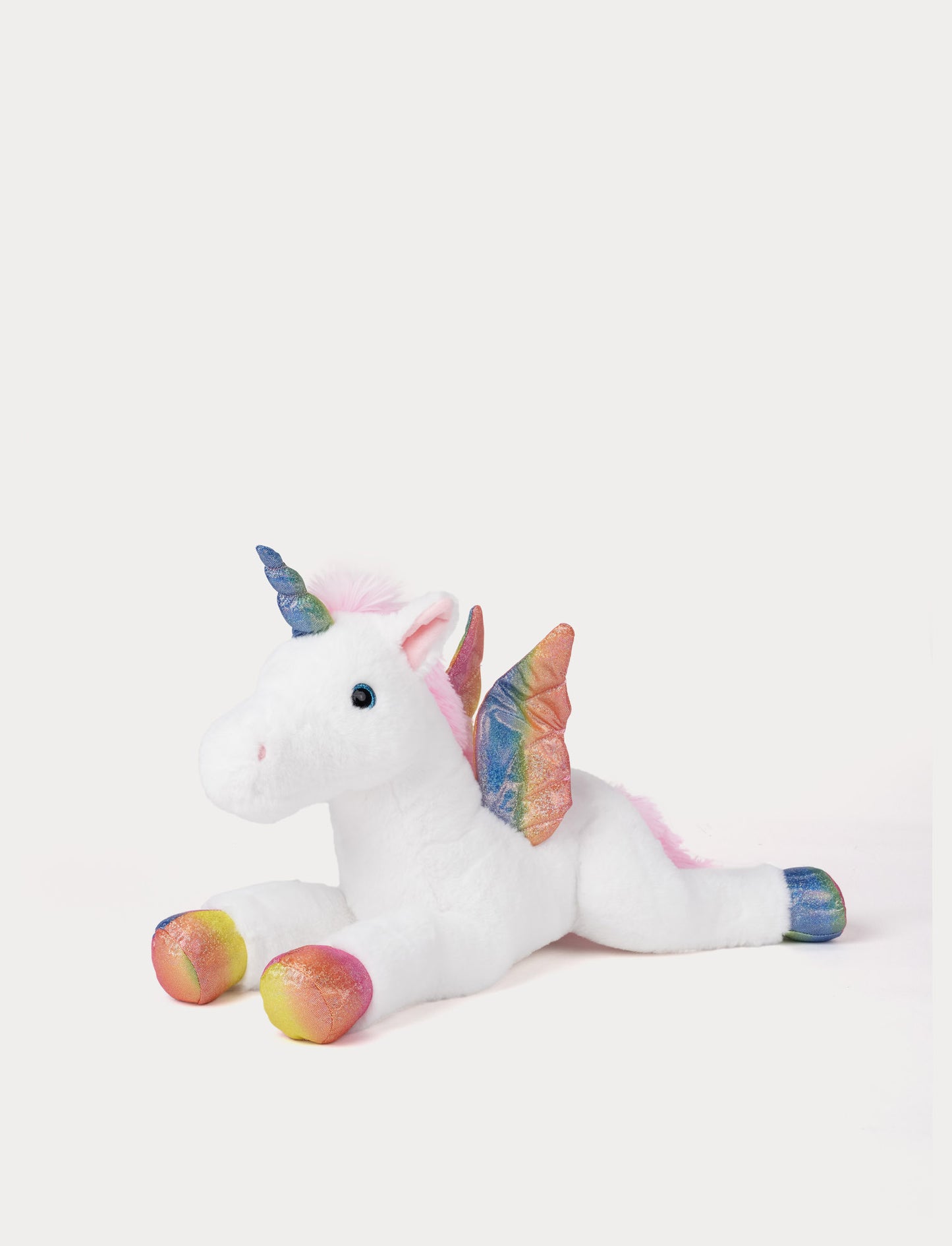 White Plush unicorn toy with shimmering rainbow details on a white background