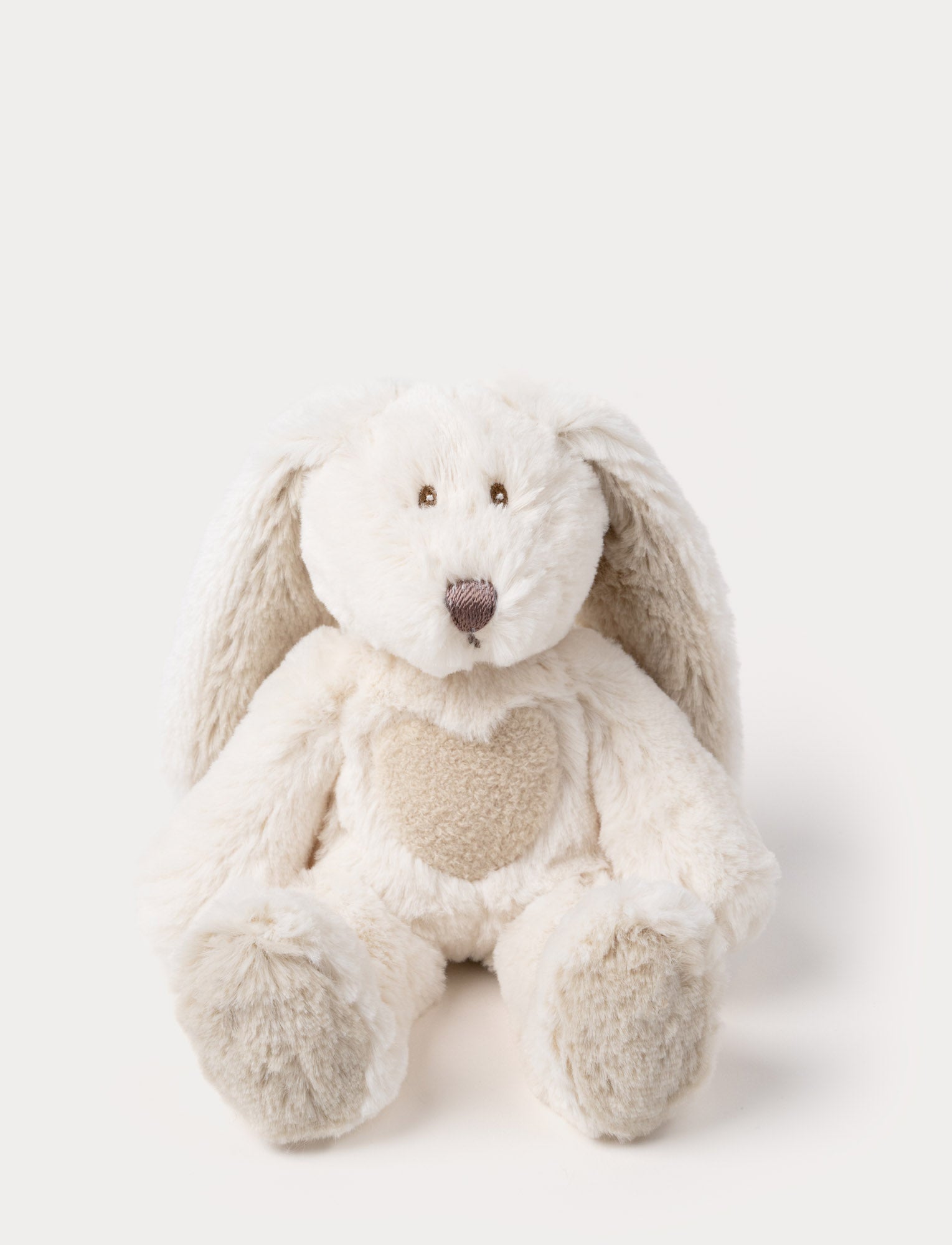  Image of A white mini bunny with long ears, a crocheted nose, and a beige heart on its belly.