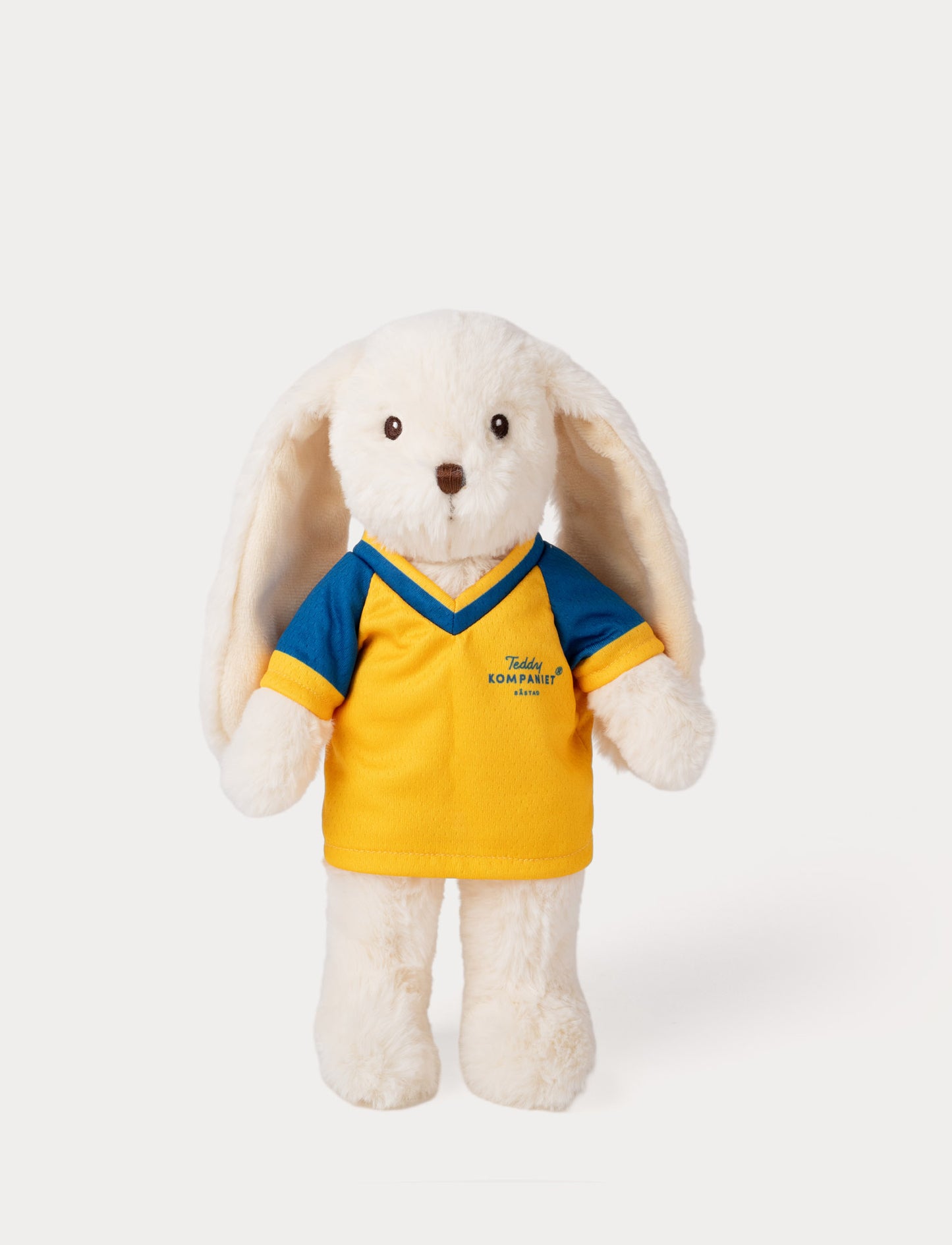 Stuffed bunny toy wearing a yellow and blue football shirt 