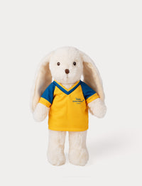 Stuffed bunny toy wearing a yellow and blue football shirt 